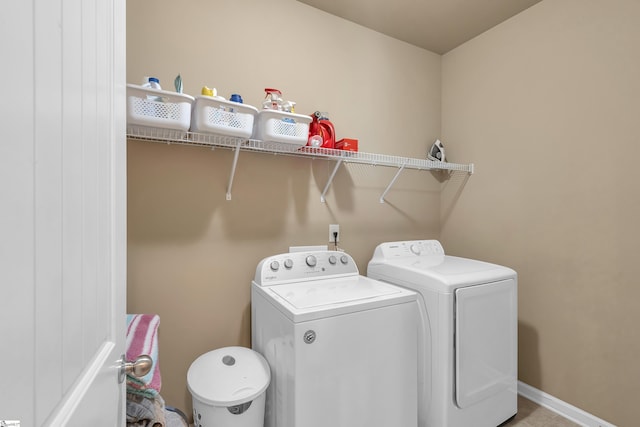 laundry room with separate washer and dryer