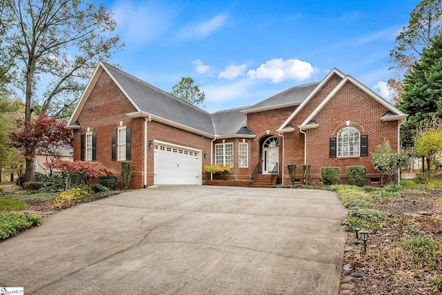 front of property with a garage