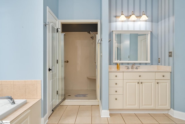 bathroom with tile patterned floors, vanity, and plus walk in shower