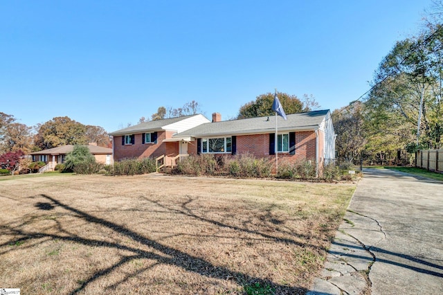 view of front of home with a front yard