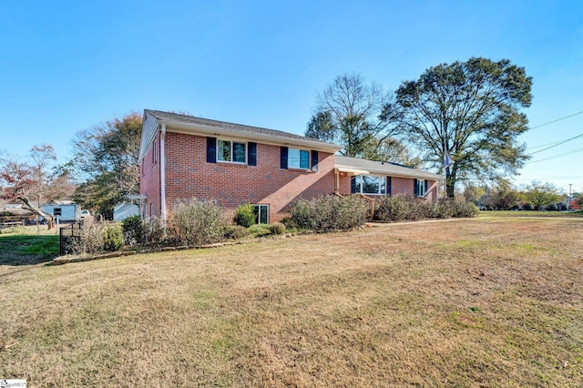 view of front of home with a front lawn