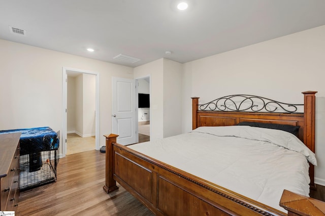 bedroom featuring light hardwood / wood-style flooring