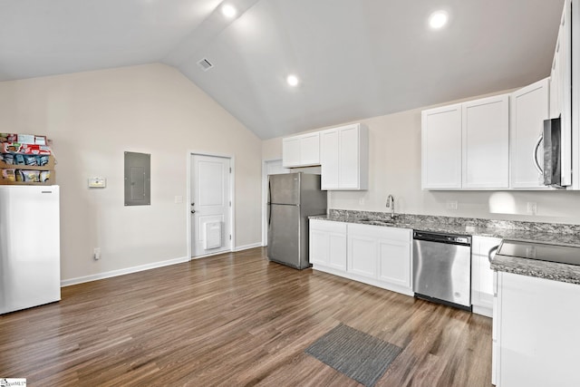 kitchen featuring stainless steel appliances, white cabinetry, dark wood-type flooring, and sink