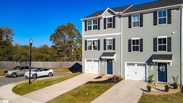 view of front of property with a garage