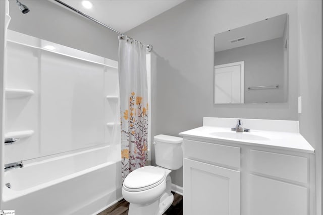 full bathroom featuring shower / tub combo with curtain, vanity, wood-type flooring, and toilet