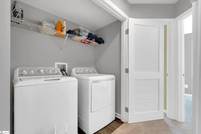 laundry area with washer and dryer and carpet floors