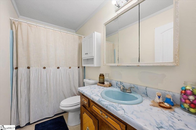 bathroom with toilet, vanity, a textured ceiling, and ornamental molding