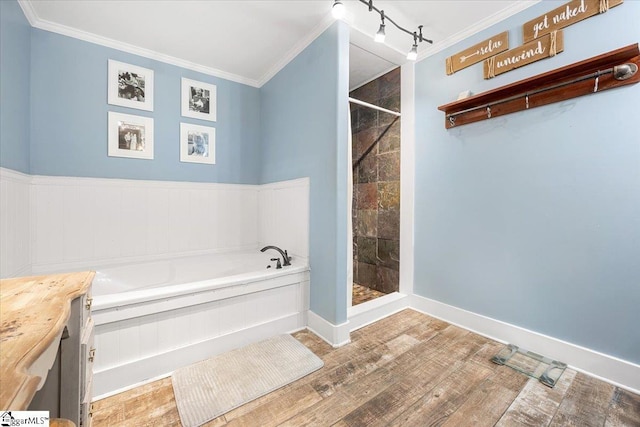 bathroom with separate shower and tub, vanity, ornamental molding, and hardwood / wood-style flooring