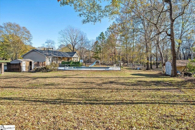 view of yard with a storage shed