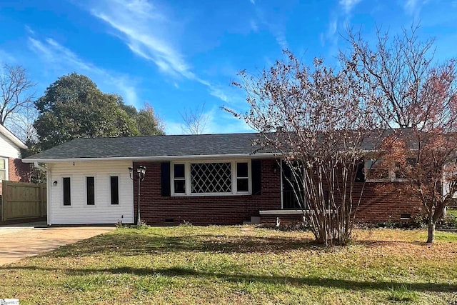 ranch-style house with a front lawn