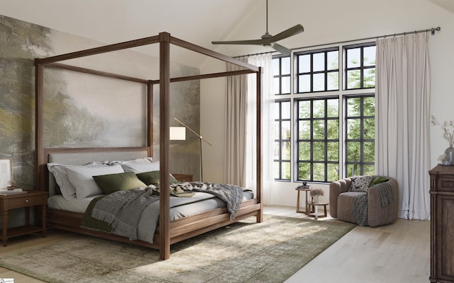 bedroom featuring wood-type flooring, a towering ceiling, and ceiling fan