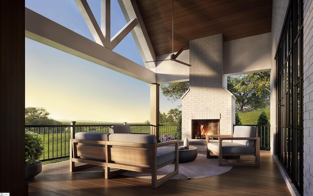 deck at dusk with an outdoor living space with a fireplace