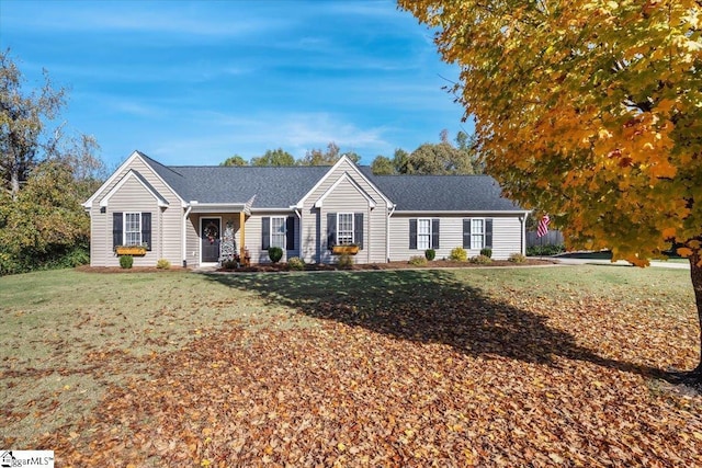 ranch-style home with a front yard