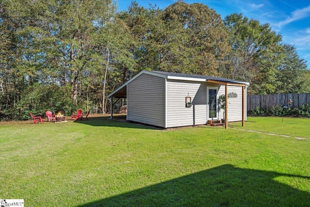 view of outdoor structure with a yard