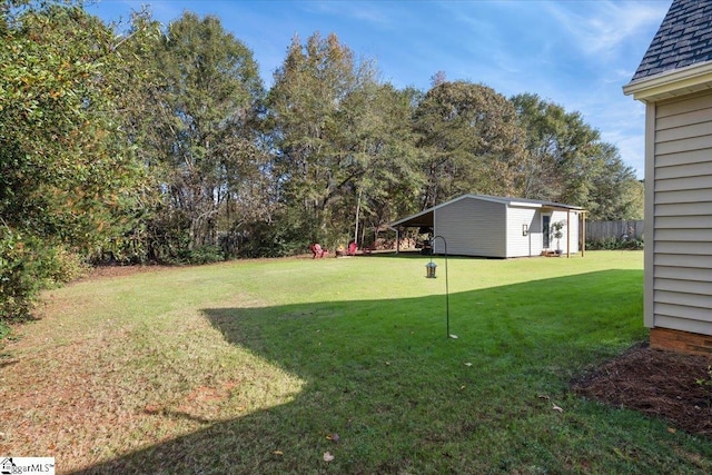 view of yard with a carport