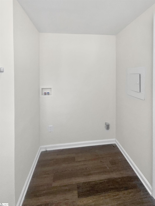 laundry area with electric panel, dark hardwood / wood-style flooring, and hookup for a washing machine