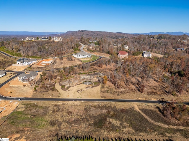 drone / aerial view featuring a mountain view