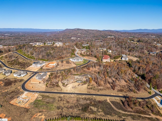 drone / aerial view featuring a mountain view