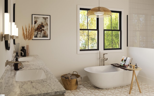 bathroom with vanity and a bath