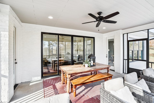 interior space with ceiling fan and a healthy amount of sunlight