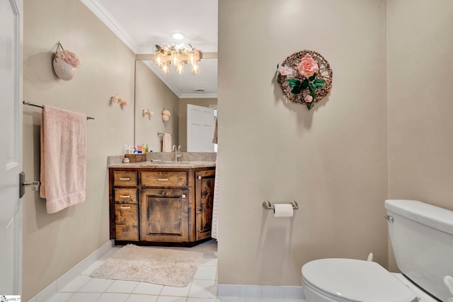 bathroom featuring tile patterned floors, toilet, vanity, and ornamental molding