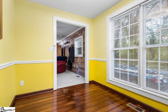 hallway featuring dark hardwood / wood-style floors