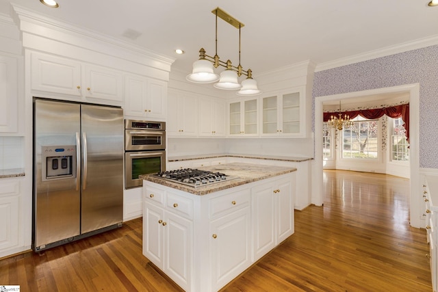 kitchen featuring white cabinets, dark hardwood / wood-style floors, and appliances with stainless steel finishes