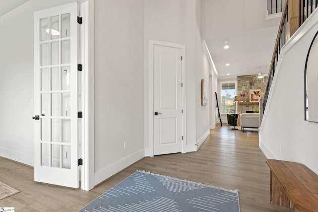 hall with light wood-type flooring