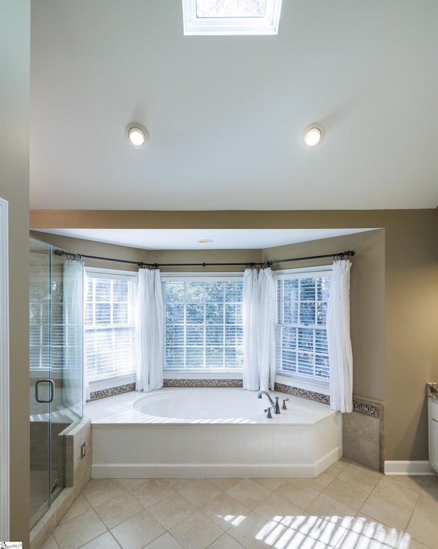 bathroom featuring vanity, tile patterned floors, and independent shower and bath