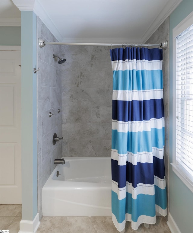 bathroom featuring tile patterned floors, ornamental molding, and shower / tub combo