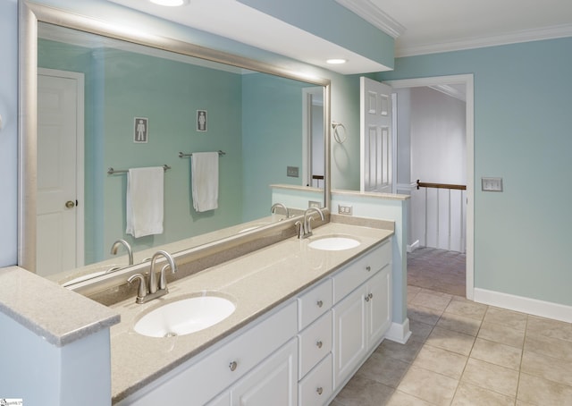 bathroom with tile patterned flooring, vanity, and ornamental molding