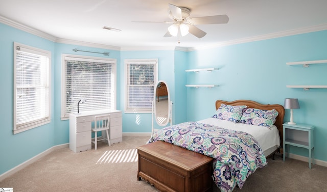 bedroom featuring light colored carpet, ceiling fan, and crown molding