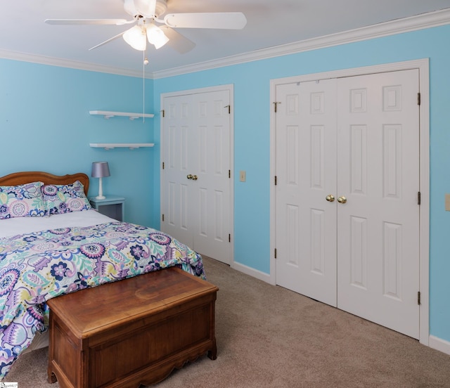 bedroom featuring ceiling fan, crown molding, and light carpet