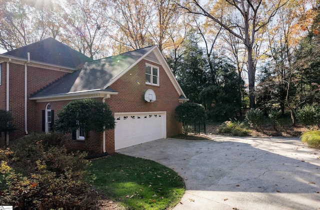 view of home's exterior with a garage