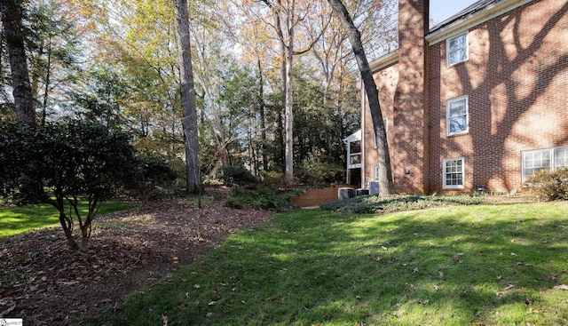 view of yard featuring central AC