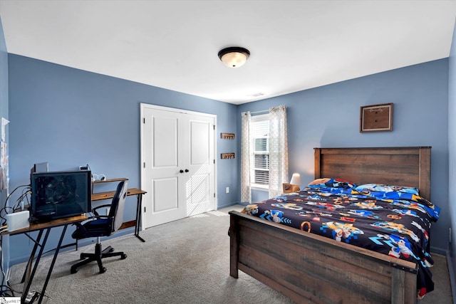 carpeted bedroom with a closet