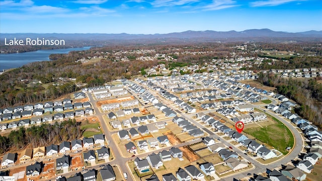 bird's eye view featuring a water and mountain view