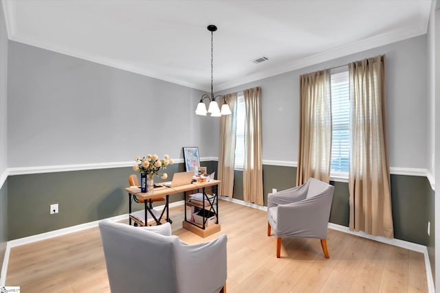 dining area with a chandelier, light hardwood / wood-style floors, and ornamental molding