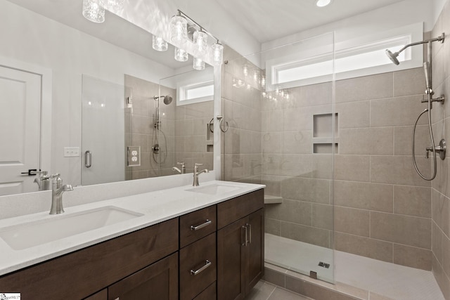 bathroom with vanity and walk in shower