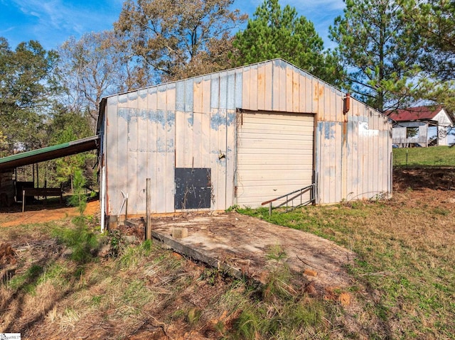 view of outdoor structure with a garage