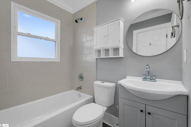 full bathroom featuring tiled shower / bath combo, vanity, toilet, and ornamental molding