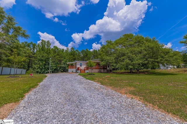 view of front of home with a front yard