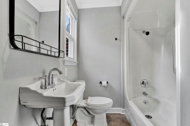 full bathroom featuring washtub / shower combination, sink, crown molding, tile patterned flooring, and toilet