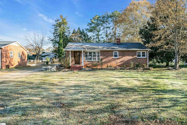 view of front of home with a front yard