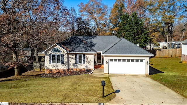 single story home with a garage and a front yard