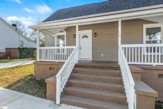 doorway to property with covered porch