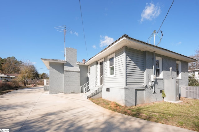 view of property exterior featuring central AC unit