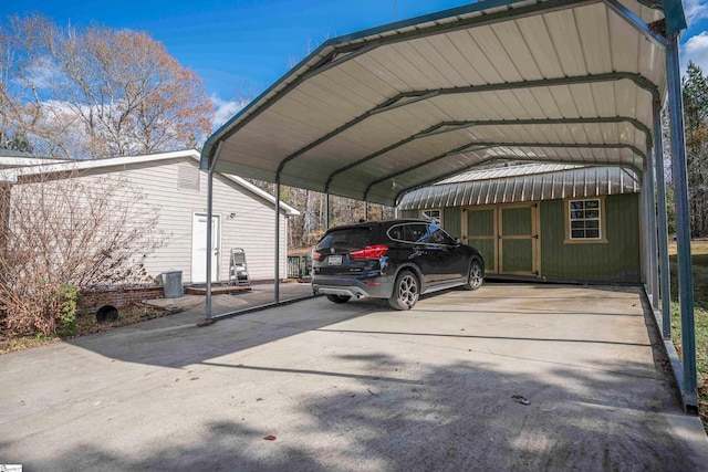 view of parking / parking lot with a carport