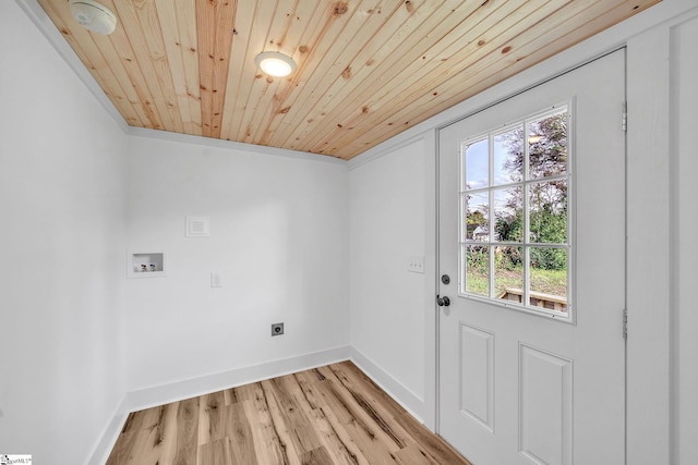 clothes washing area featuring hookup for a washing machine, light hardwood / wood-style flooring, crown molding, and wood ceiling