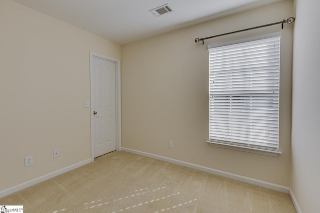 view of carpeted spare room